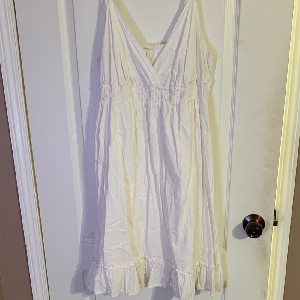 Chic White Midi Dress with Ruffle Hem